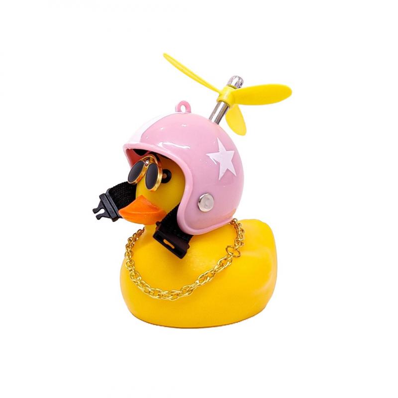 Imagen ilustrativa de CASCO ROSA DIBUJO RACING CON ANTEOJOS, CADENA Y HELICE
