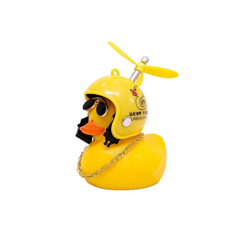 Imagen ilustrativa de CASCO AMARILLO DIBUJO PATITO CON ANTEOJOS, CADENA Y HELICE